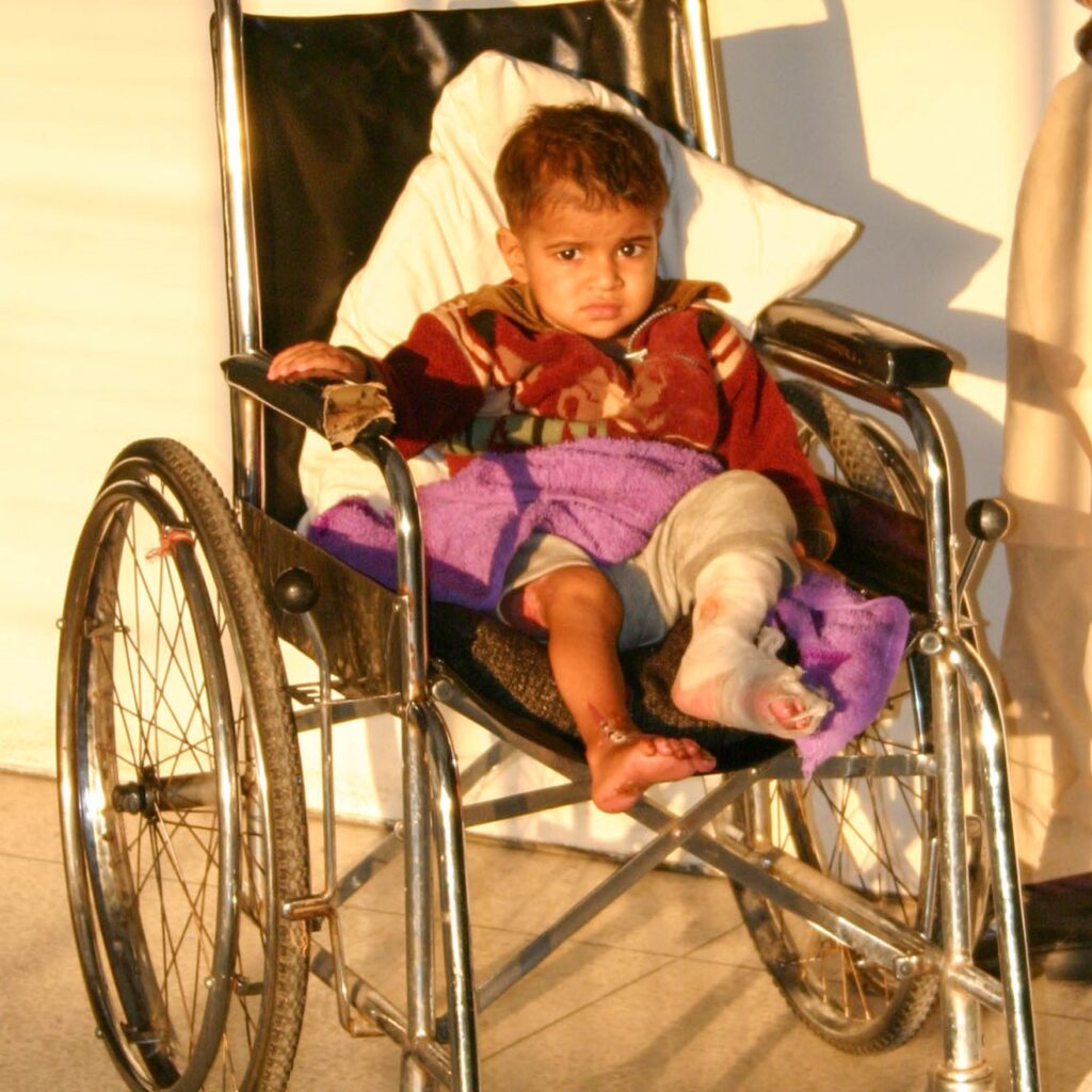 Child in wheelchair Pakistan 2005