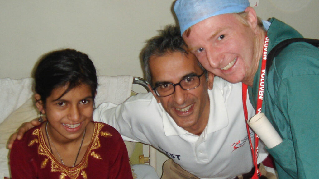 A patient and two medical staff