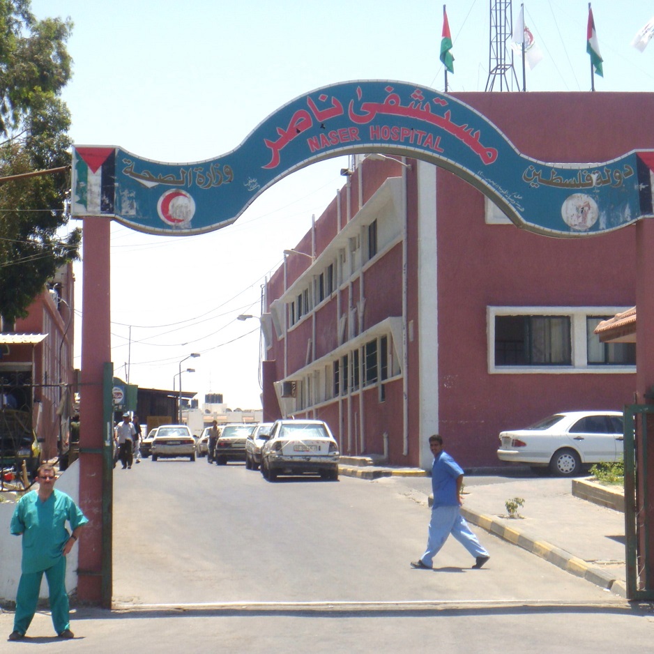 Peter Naylor stands outside the gates of Nasser Hospital, Gaza