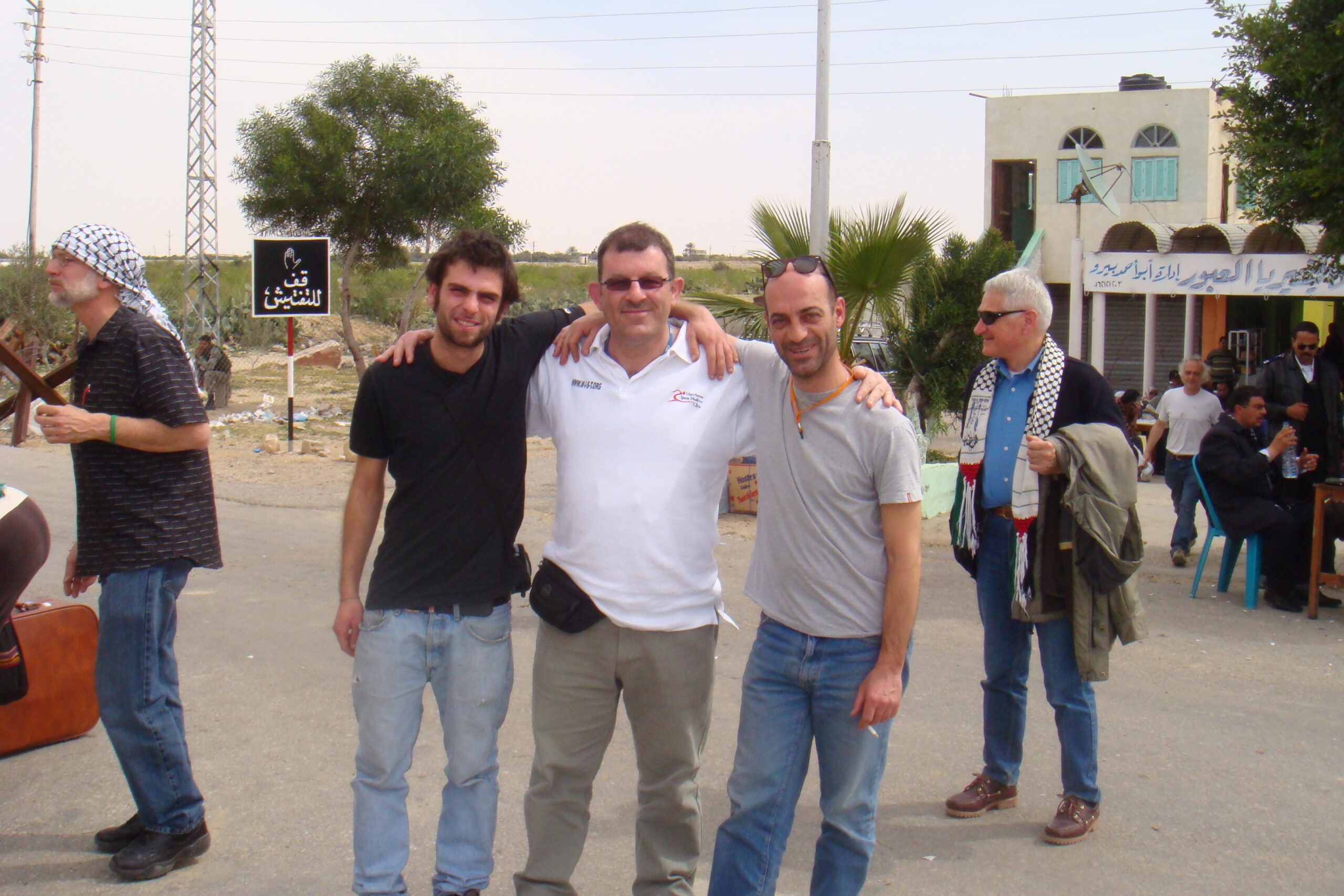 peter standing at Rafah border with other workers March 2009